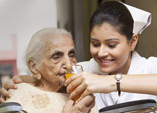 Nurse taking care of elder patient